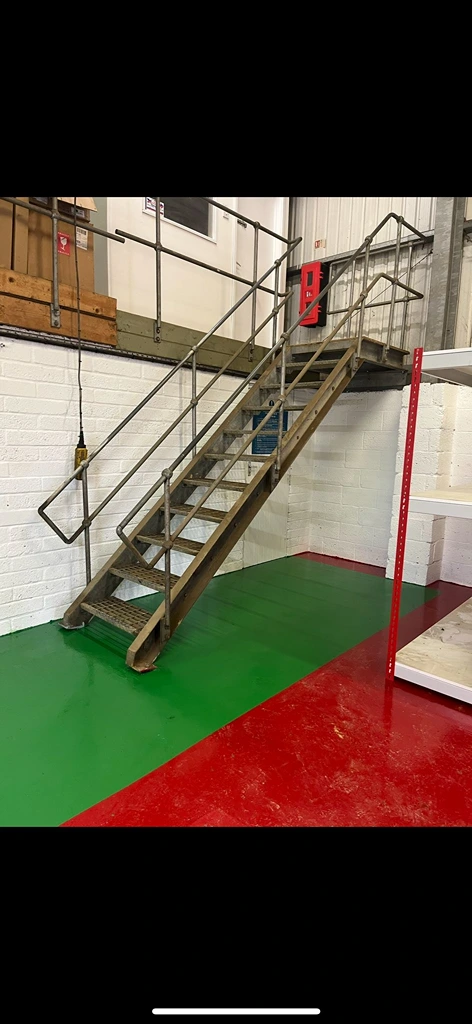Industrial staircase transformation before