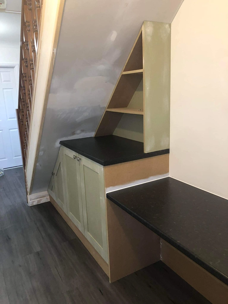 Fire-damaged staircase restoration before